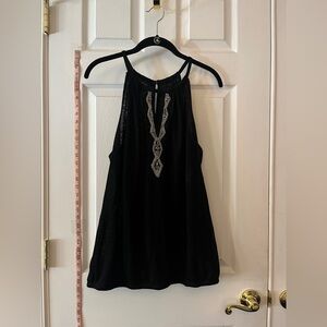 EUC-INC sleeveless shirt w/ silver beading, elastic bottom of shirt
Black, sz XL